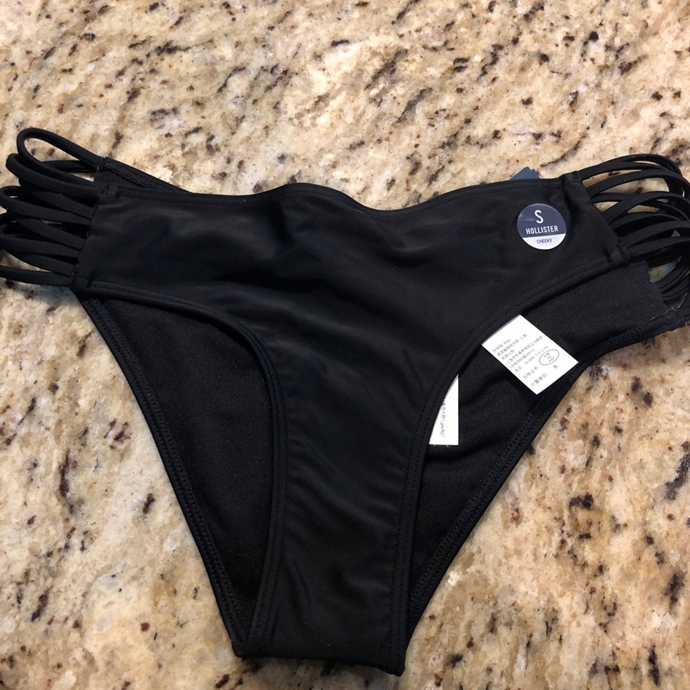 strappy, cheeky black bottoms